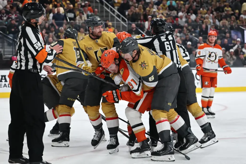 The Ducks’ Leo Carlsson (91) and the Vegas Golden Knights’...