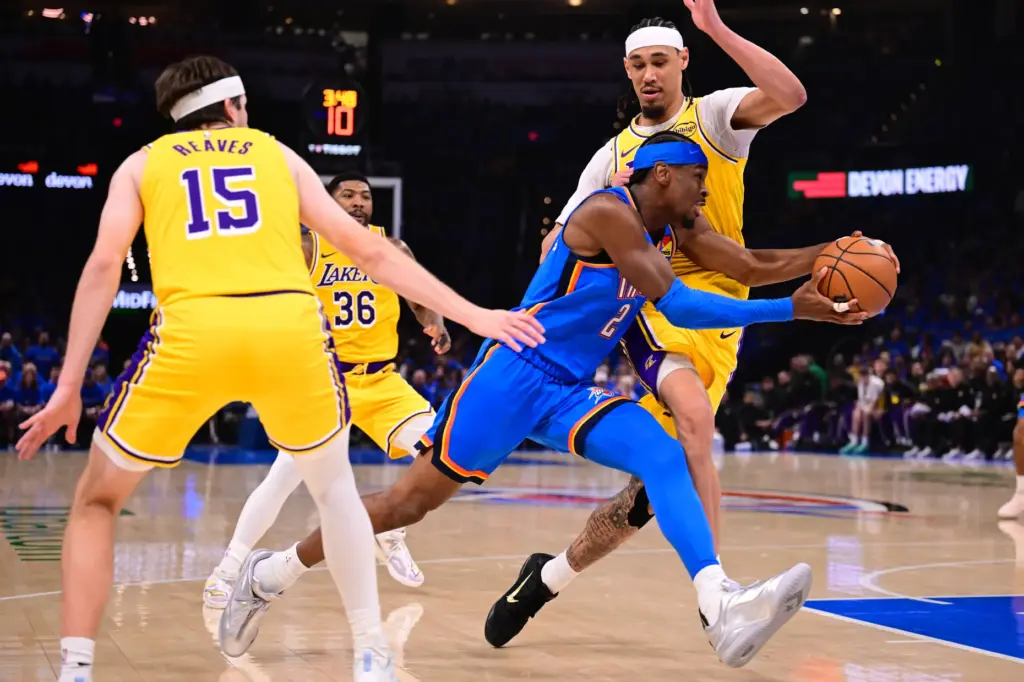 Oklahoma City Thunder star Shai Gilgeous-Alexander drives to the basket...