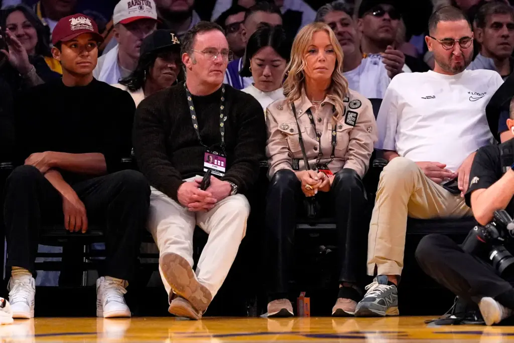 Lakers minority owner Jeanie Buss, second from right, watches with...