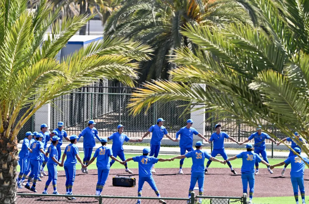 UCLA Bruins warmup on a practice field Prior to a...