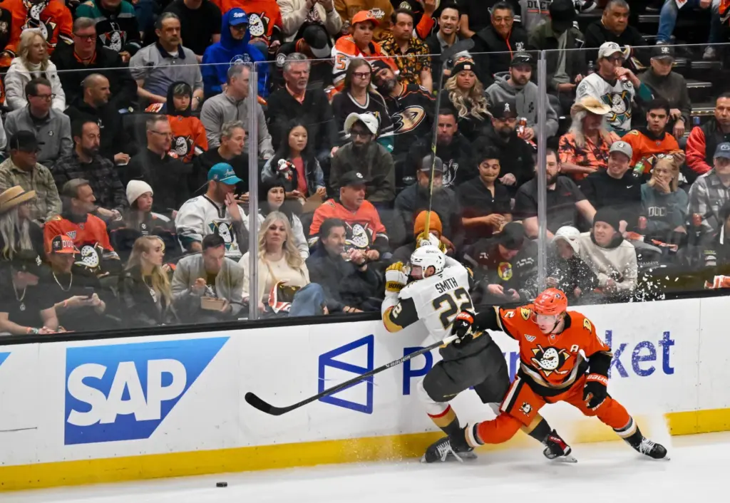 The Ducksâ Jackson LaCombe, right, and the Vegas Golden Knightsâ...