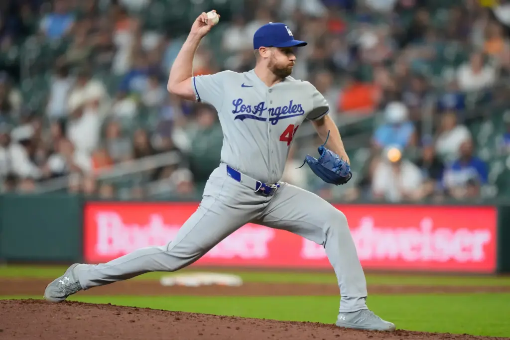 Dodgers relief pitcher Brock Stewart throws to the plate during...