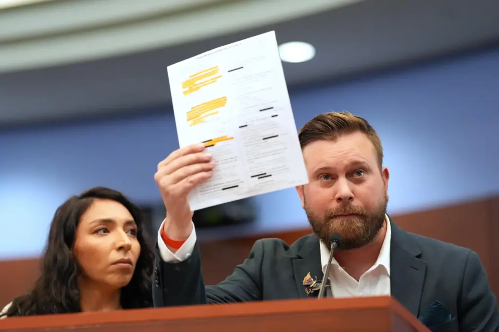 Sky Roberts, brother of Virginia Giuffre, stands with his wife Amanda.