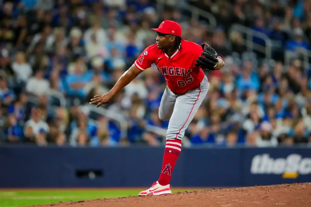 Angels relief pitcher JosÃ© Fermin throws to the plate during...