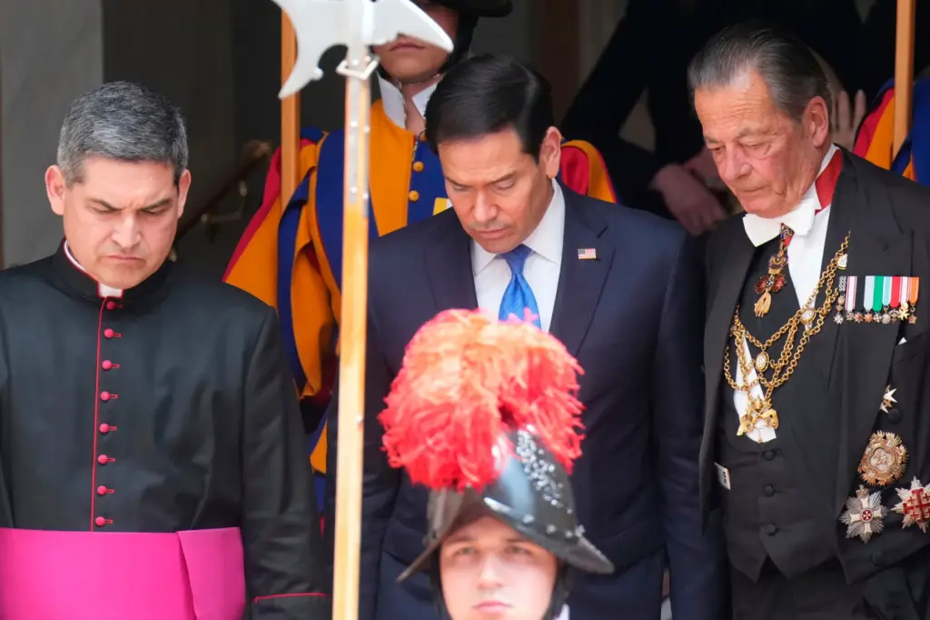 Secretary of State Marco Rubio leaves the St. Damasus courtyard after meeting with Pope Leo XIV.