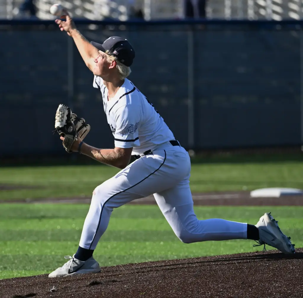 Colton Nicolaisen (11) of Newport Harbor pitches against Trabuco Hills...