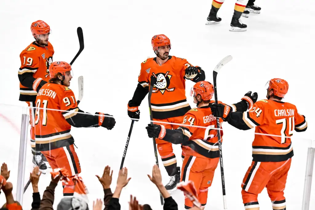 Ducks players, including John Carlson (74), Leo Carlsson (91) and...