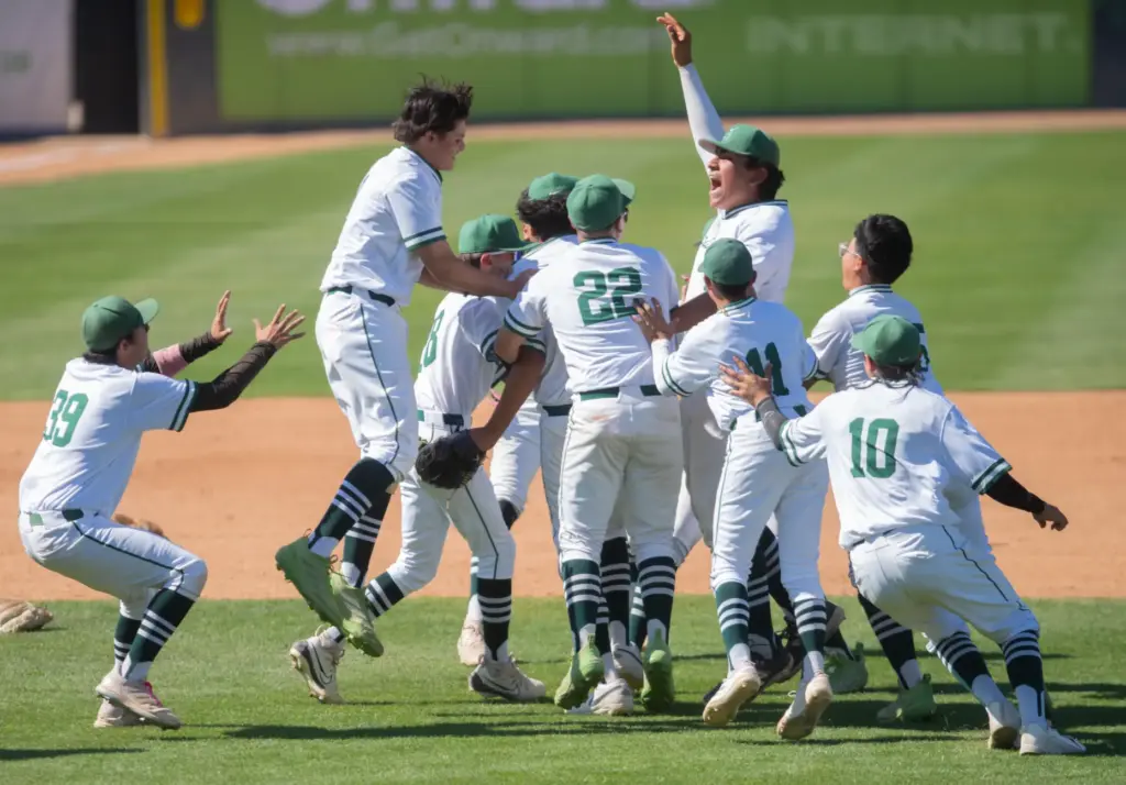 Schurr High School celebrates after defeating Rancho Alamitos in a...