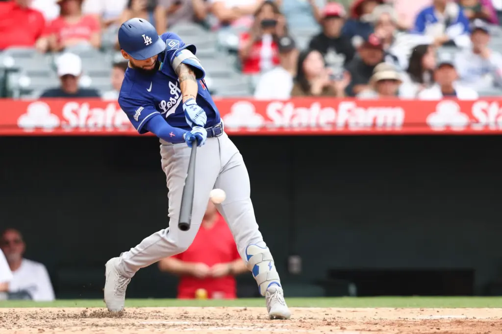 Dodgers’ Andy Pages hits an RBI single during the fourth...