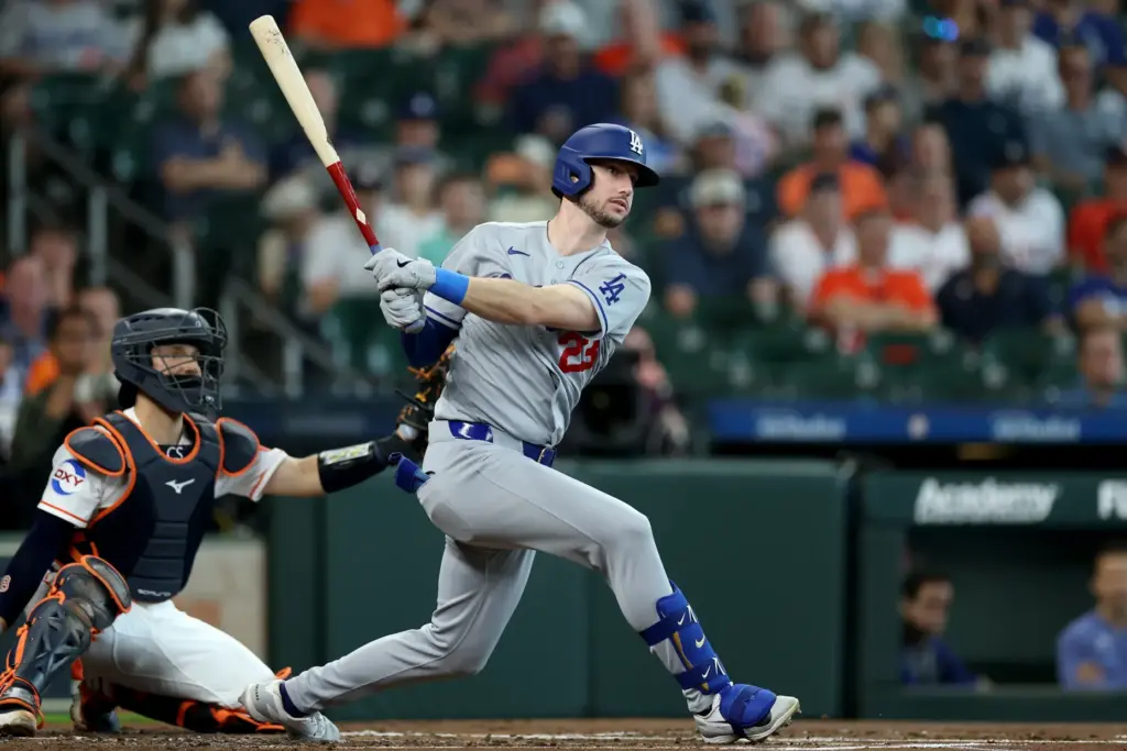 The Dodgers’ Kyle Tucker hits a double during the second...
