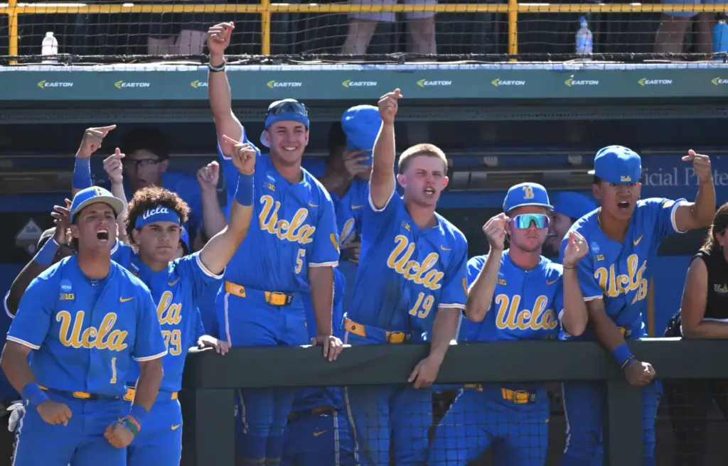 UCLA Bruins celebrates a home run against the Virginia Tech...