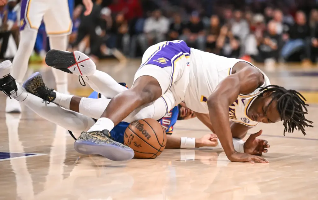 Lakers forward Adou Thier, front, and the Oklahoma City Thunder’s...