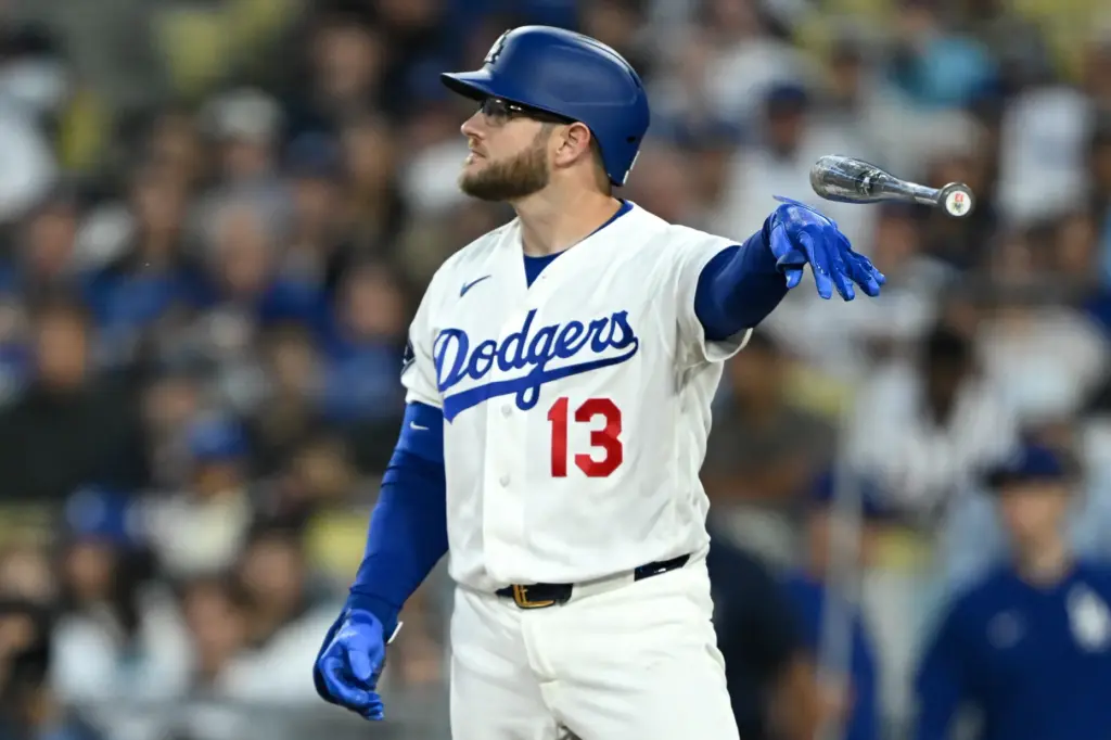 The Dodgers’ Max Muncy tosses his bat after he struck...
