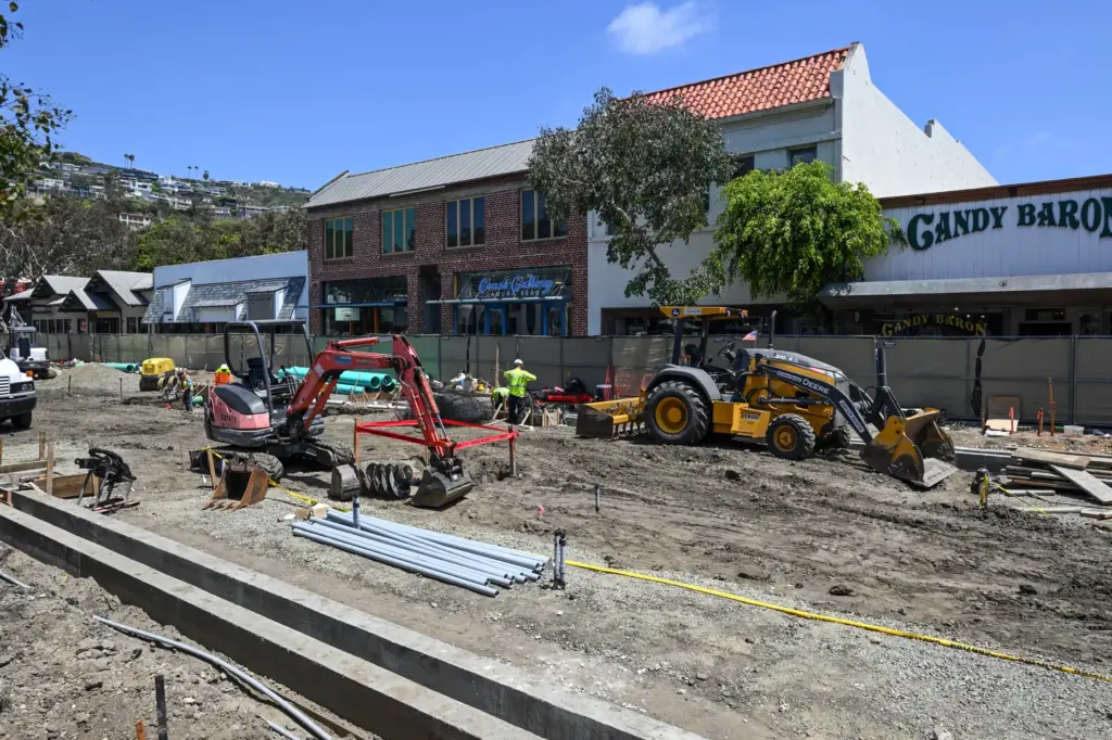 Construction continues in the 200 block of Forest Avenue as...