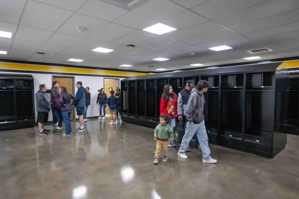 Capistrano Valley High School families tour a new locker room...