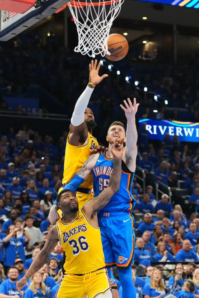 Oklahoma City Thunder center Isaiah Hartenstein (55) shoots as Lakers...