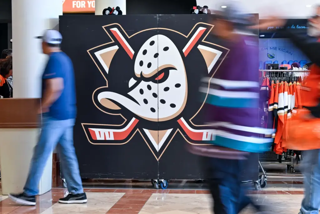 Ducks fans make their way into the Honda Center before...
