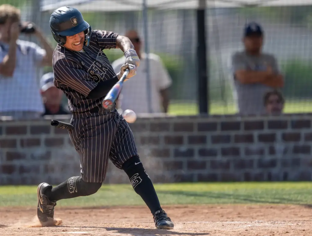 Servite outfielder Michael Cabral hits the ball during a CIF-SS...
