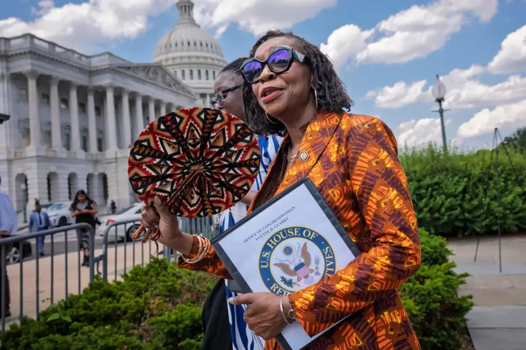 Rep. Yvette Clarke, chair of the Congressional Black Caucus, prepares for a news conference.