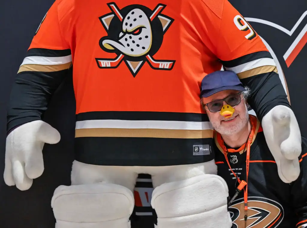 Michael Rakijas of Yorba Linda, wearing a Ducks jersey and...