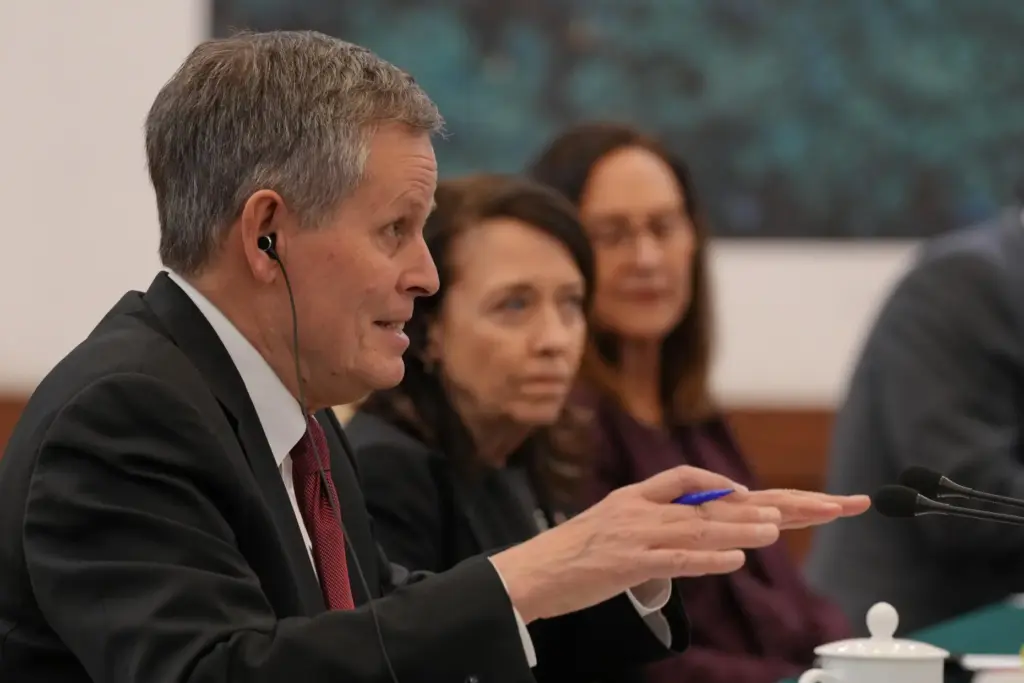 U.S. Senator Steve Daines speaks next to his congressional delegation in Beijing.
