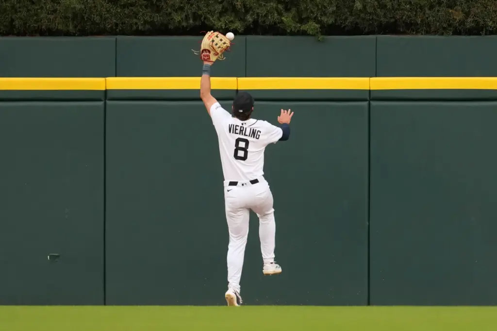 Detroit Tigers center fielder Matt Vierling can’t reach a fly...
