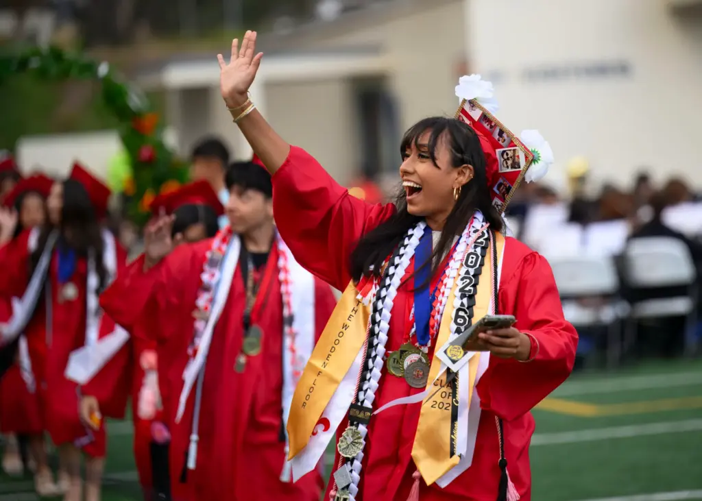 Kuanari Morales Paque finds her family in the stands as...