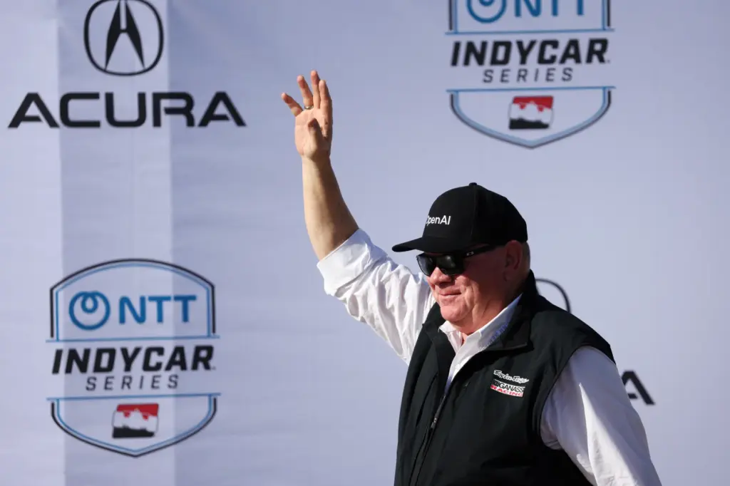 Chip Ganassi Racing owner Chip Ganassi celebrates after his driver,...