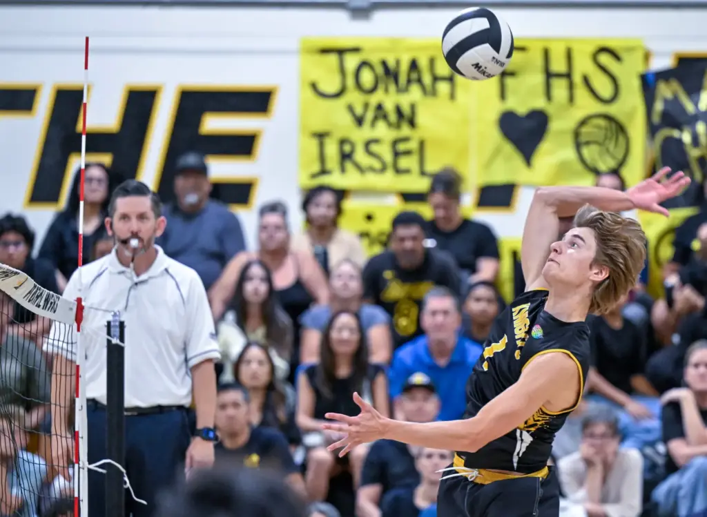 Foothill outside hitter Jonah Van lersel winds up for a...