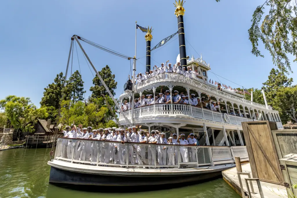 U.S. Sailors, Marines and Coast Guardsmen ride the Mark Twain...
