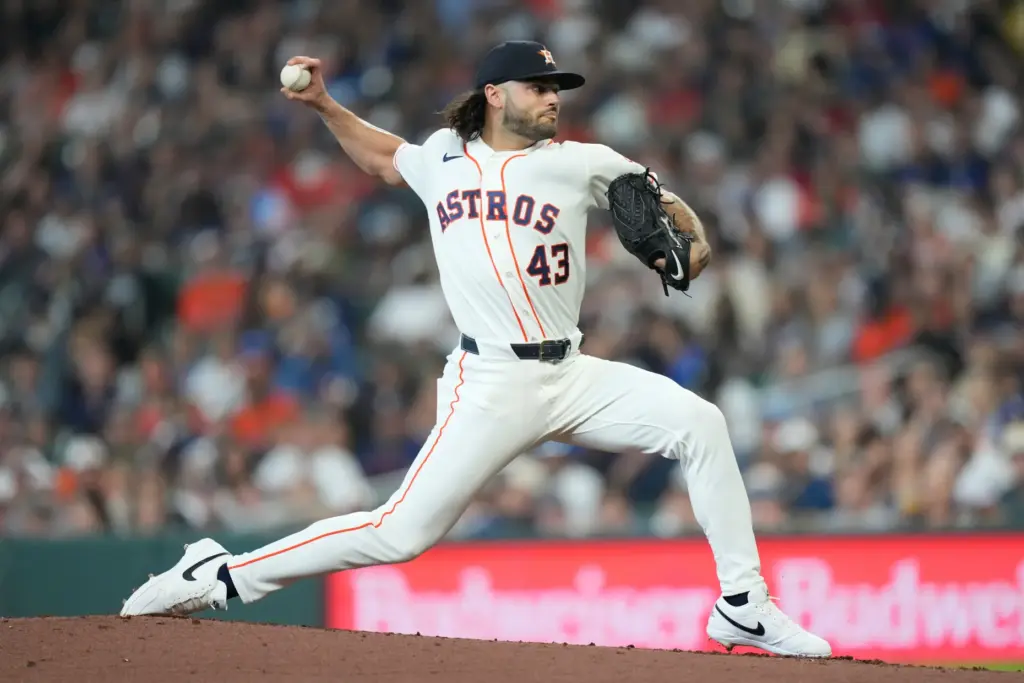 Houston Astros starting pitcher Lance McCullers Jr. throws to the...