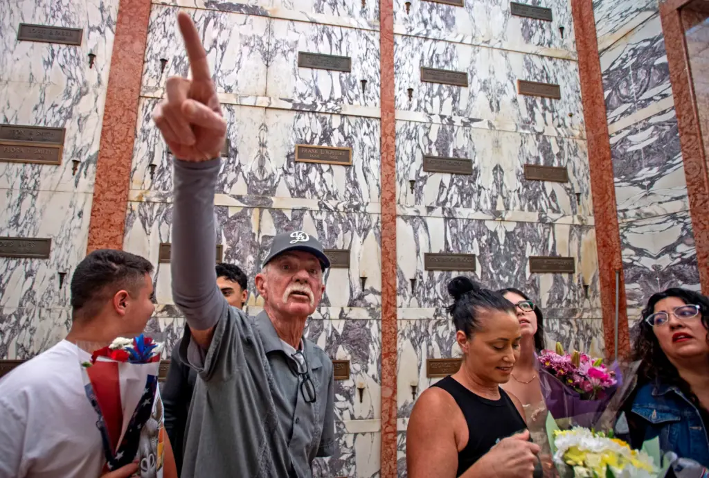 Vietnam War veteran Charles Cuttress points out other loved ones...