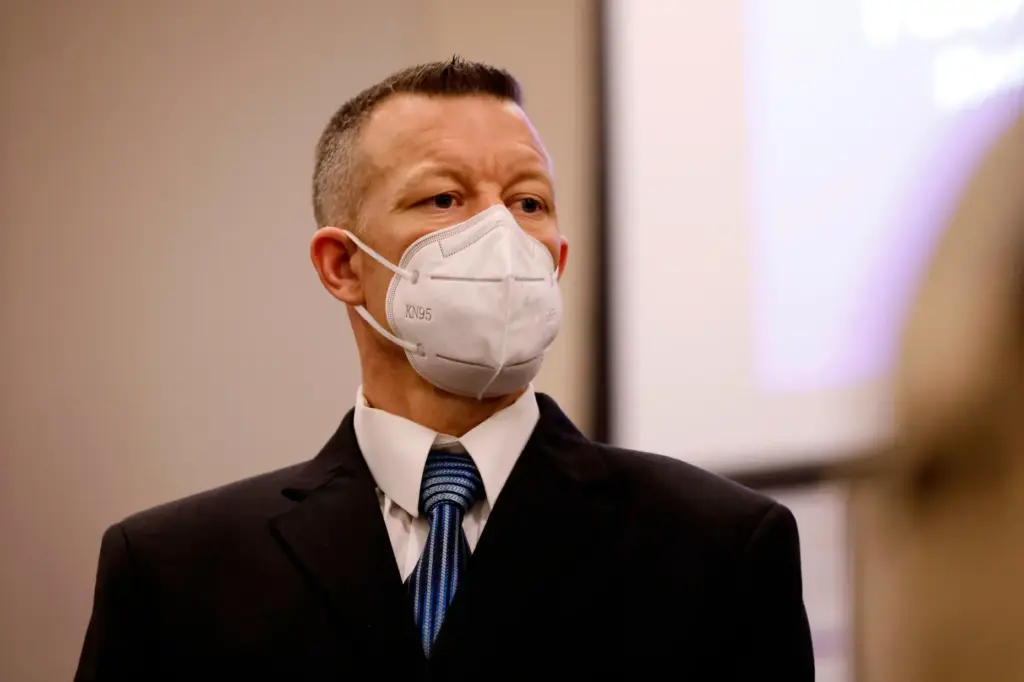 Paul Flores listens during his murder trial