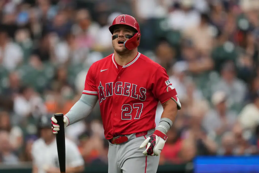 Angels star Mike Trout reacts after striking out during the...