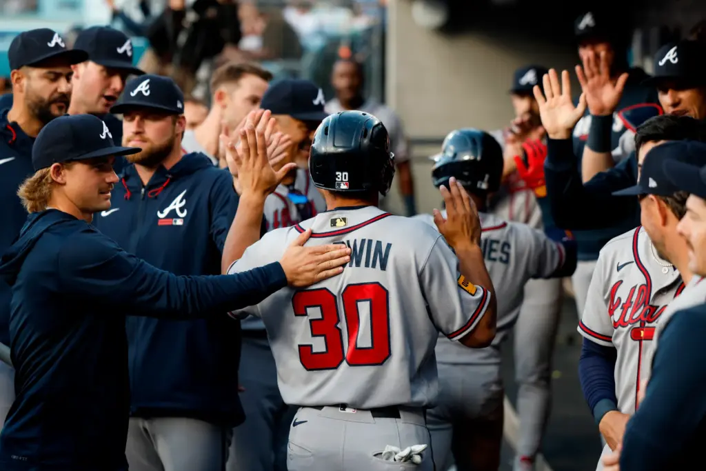 Atlanta Braves designated hitter Drake Baldwin (30) is greeted by...