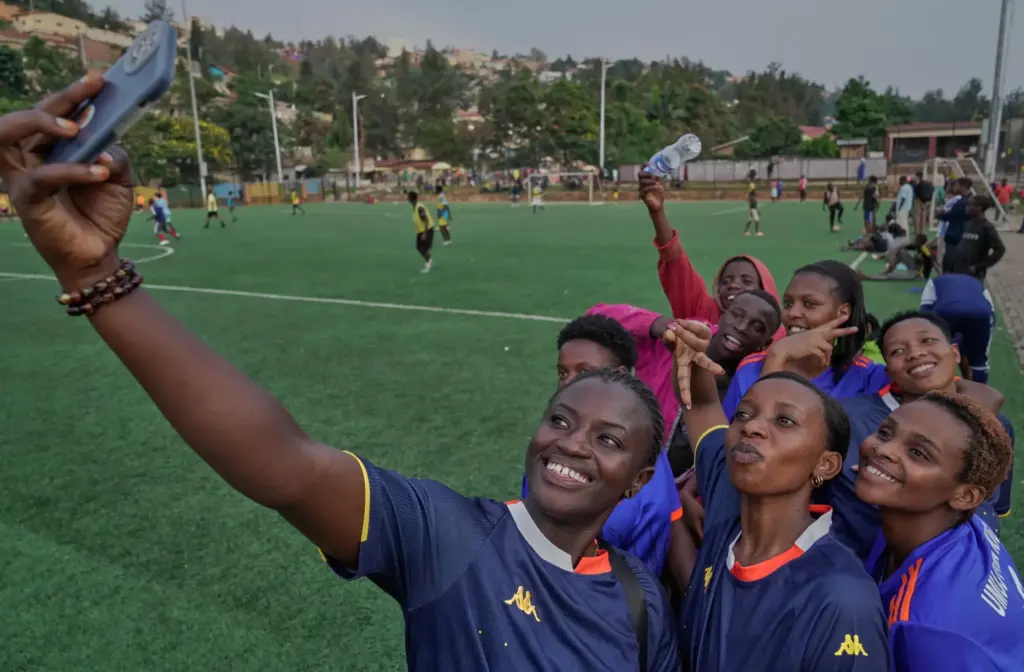 Soccer players on the Rwanda Amputee team pose for a...