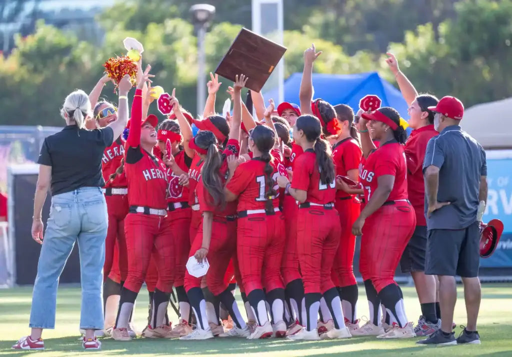 Whittier Christian players celebrate their 5-3 win over Mater Dei...