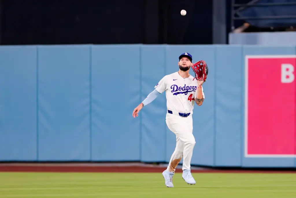 Dodgers center fielder Andy Pages catches a fly ball hit...