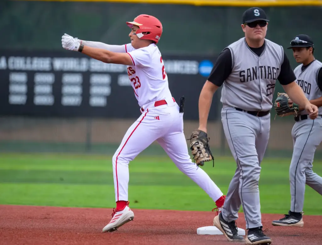 Orange Lutheran’s Ricardo Hurtado celebrates after hitting a double against...