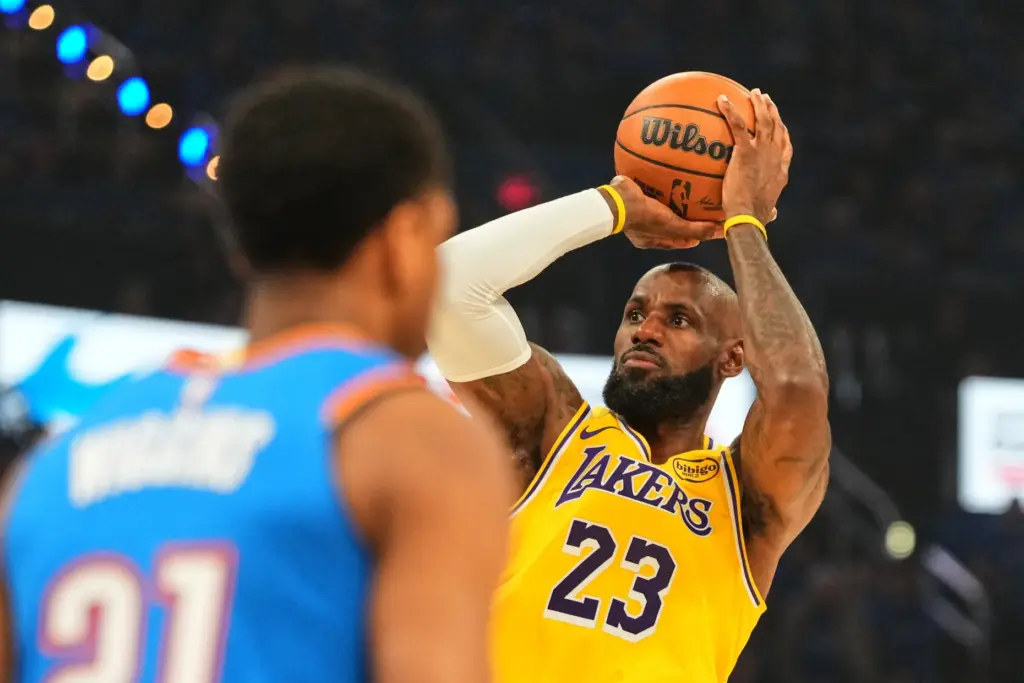 Lakers forward LeBron James shoots during the first half of...