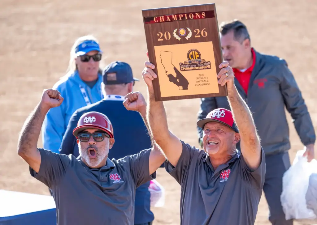 Whittier Christian coaches Jack Hernandez, left, and head coach Dale...