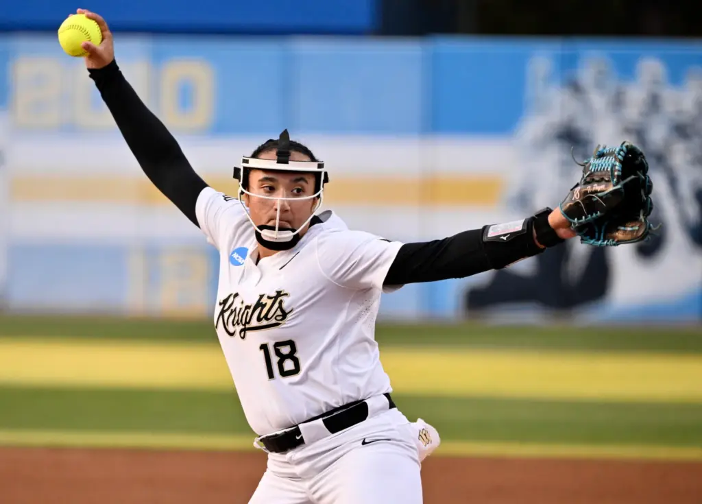 Starting pitcher Tori Payne #18 of the UCF Knights throws...