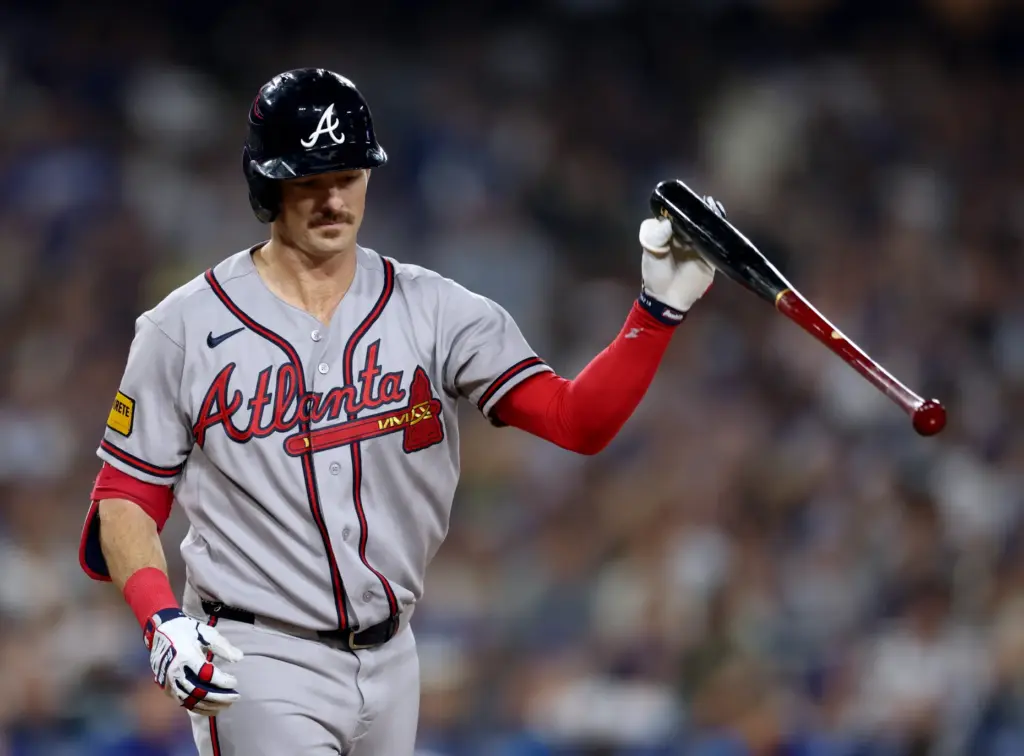 The Atlanta Braves’ Mike Yastrzemski shows his frustration after striking...