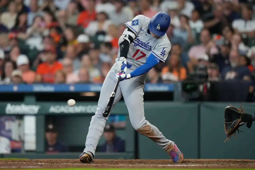 Dodgers star Shohei Ohtani hits a single during the fifth...