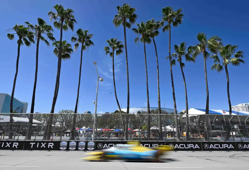 Indycar driver Christian Rasmussen races down Shoreline Drive during the...