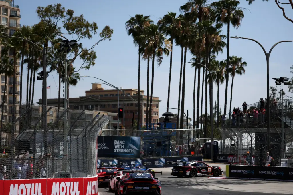 Porsche Carrera Cup North America drivers head into turn 11...
