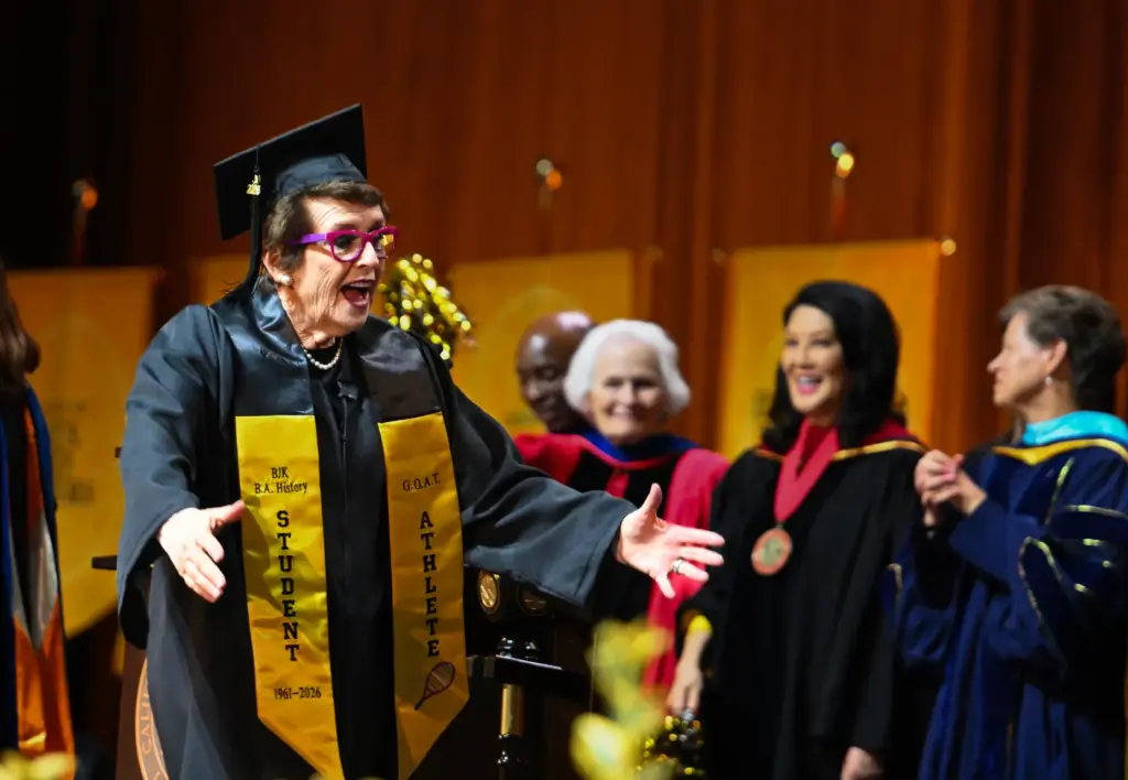 Billie Jean King walks the stage as she receives her...
