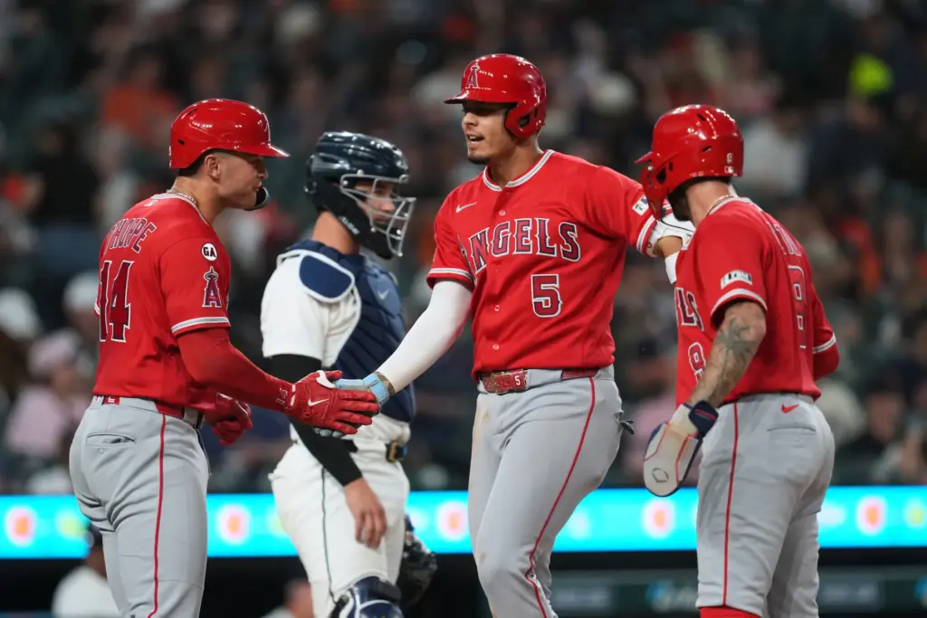 The Angels’ Vaughn Grissom (5) celebrates with teammates Logan O’Hoppe,...