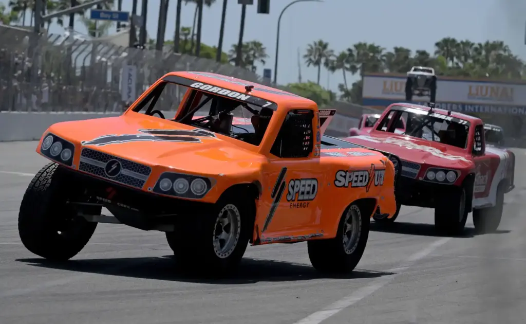 Stadium Super Trucks driver Robby Gordon races off of Pine...