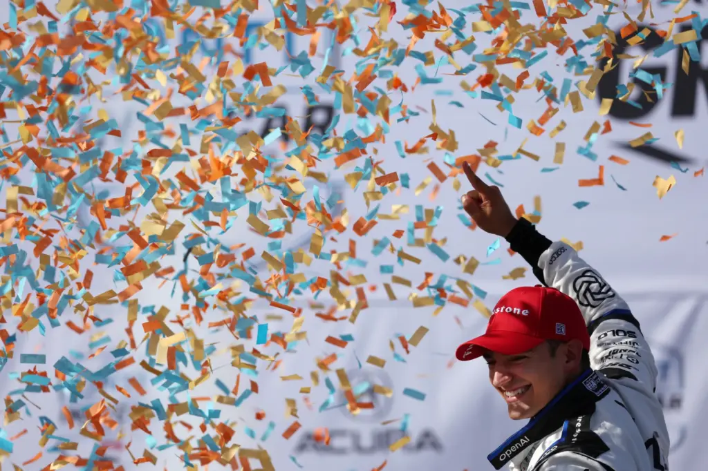 Indycar driver Alex Palou celebrates after winning the 51st Grand...